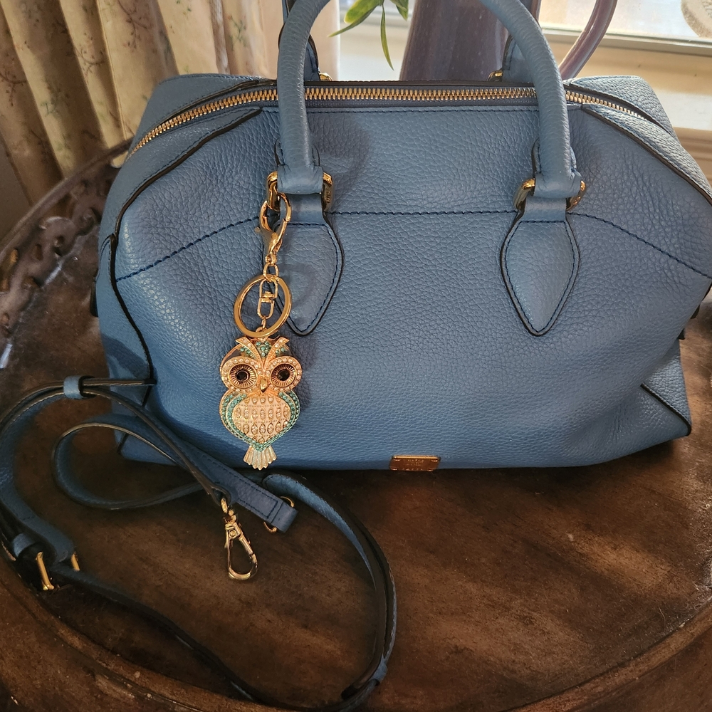 MCM Light Blue Satchel with crossbody strap Gold Accent.
